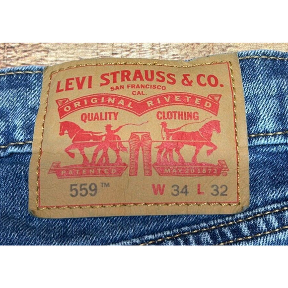 Levis 559 Shorts Mens 34 Blue Denim Cutoffs Measures 34X12 Raw Hem Medium Wash - Picture 6 of 7